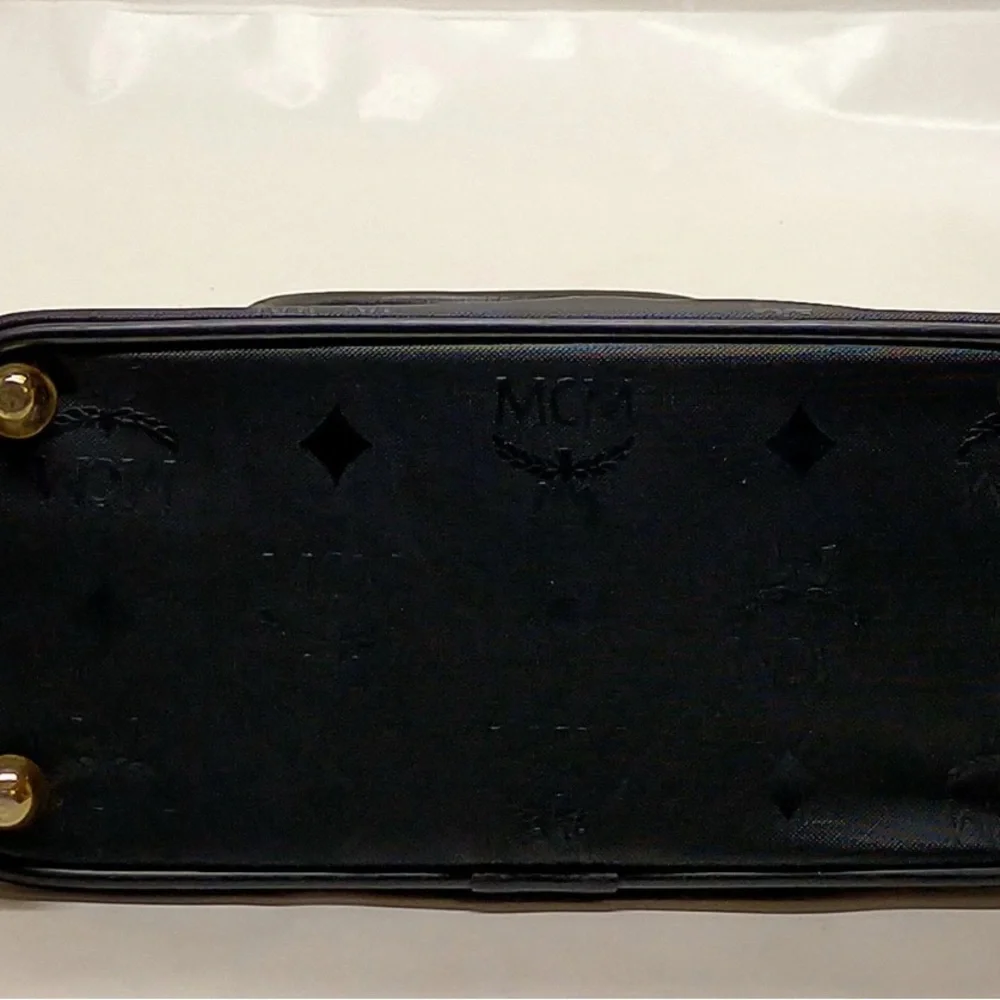 MCM Black Satchel with Gold Accents lock and key included authentic